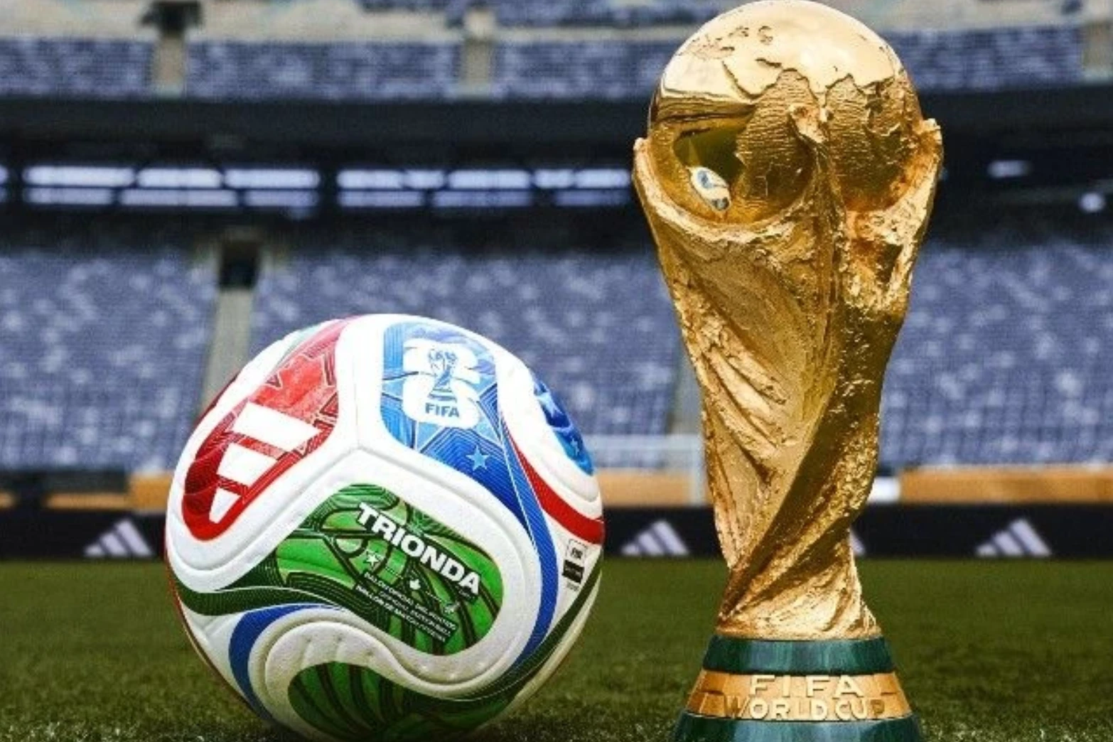 Bola e a taça da Copa. Divulgação/Adidas